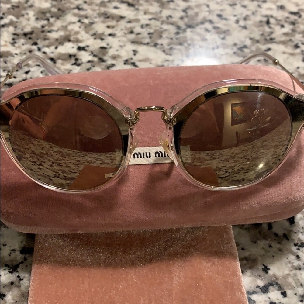 Miu Miu Round 49 mm sunglasses